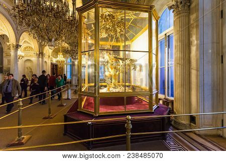 Saint Petersburg, Russia - March 16, 2018: Visitors In Peacock Clock Hall In Hermitage Museum. The S