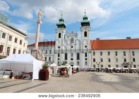 Gyor, Hungary - August 10, 2012: People Visit Old Town In Gyor, Hungary. In 2011 Tourism Receipts In