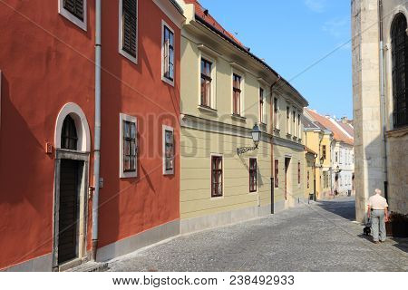 Gyor, Hungary - August 10, 2012: People Visit Old Town In Gyor, Hungary. In 2011 Tourism Receipts In