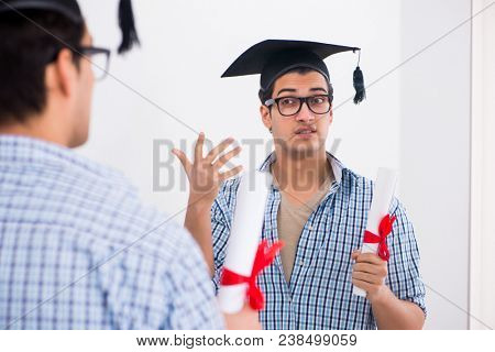 Young student planning graduation speech in front of mirror