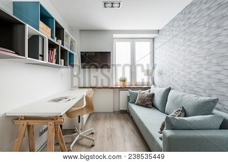 White Desk, Couch And Bookcase