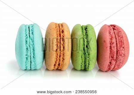 Colorful Macaroons Isolated On White Background Closeup.