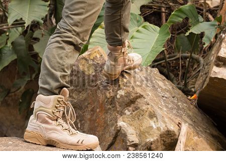 Close Up Trekking Feet Standing On A Rock, Hiker Stands On A Rock