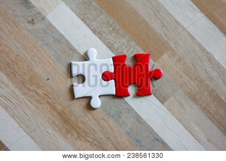 White And Red Jigsaw Puzzles, Concept Of Teamwork, Teamwork Concept.