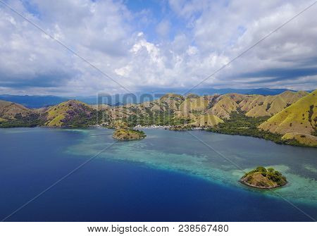 Beautiful Aerial View Of Beaches And Tourist Boat Sailing In Flores Island, Indonesia.
