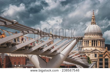 London,Uk:7.27.18 - The Millennium Bridge, officially known as the London Millennium Footbridge, a steel suspension bridge for pedestrians crossing the River Thames  linking Bankside with the City