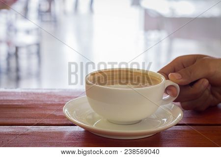 Black Coffee Mug On Wooden Stick In The Coffee Shop