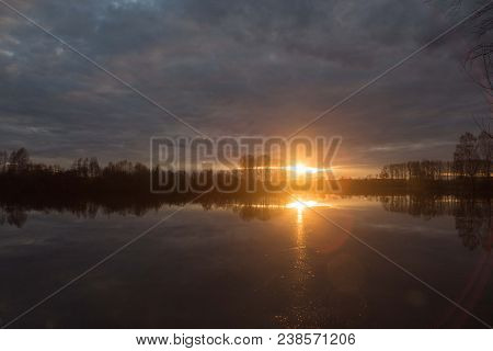 Sunset On The Lake On A Warm Spring Evening