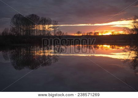 Sunset On The Lake On A Warm Spring Evening