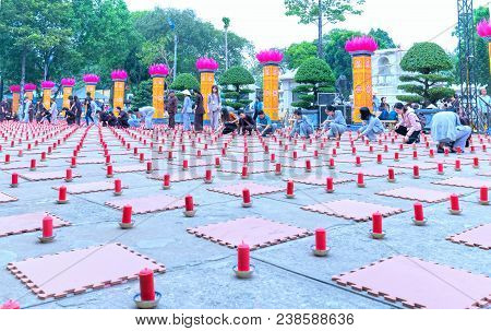 Ho Chi Minh City, Vietnam - January 3, 2018: Buddhist Party Came Prepared With Hundreds Candles Line