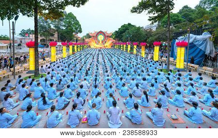 Ho Chi Minh City, Vietnam - January 3, 2018: Buddhist Party Came Prepared With Hundreds Candles Line