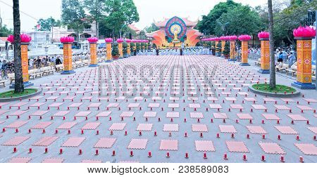 Ho Chi Minh City, Vietnam - January 3, 2018: Buddhist Party Came Prepared With Hundreds Candles Line