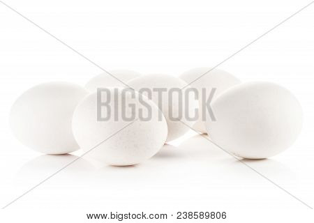 Six White Chicken Eggs Isolated On White Background