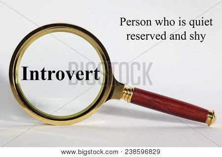 Introvert  Concept - Looking At Introvert Through A Magnifying Glass.