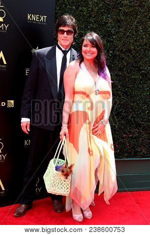 LOS ANGELES - APR 29:  Ronn Moss, Devin DeVasquez at the 45th Daytime Emmy Awards at the Pasadena Civic Auditorium on April 29, 2018 in Pasadena, CA
