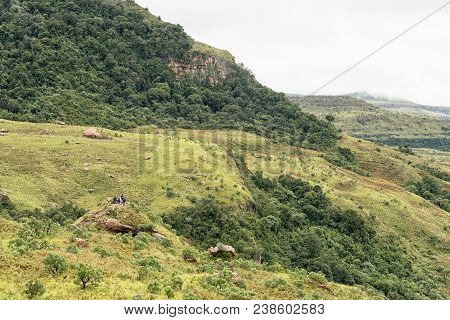 Royal Natal National Park, South Africa - March 17, 2018: Unidentified Hikers On Lookout Rock Near M