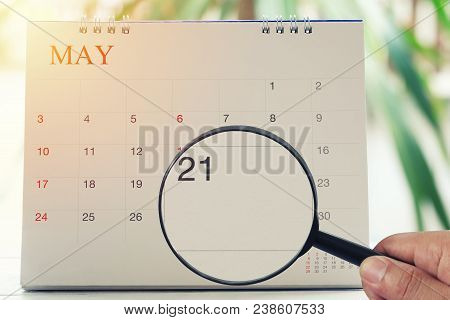 Magnifying Glass In Hand On Calendar You Can Look Twentieth One Day Of Month,focus Number Twenty-one