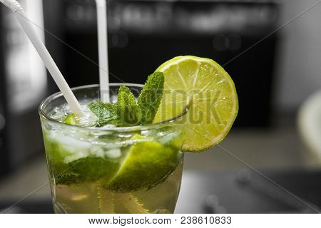 Closeup Glass Of Unalcohol Mohito Cocktail With Lime And Mint Decorated With Slice Of Lime And With 