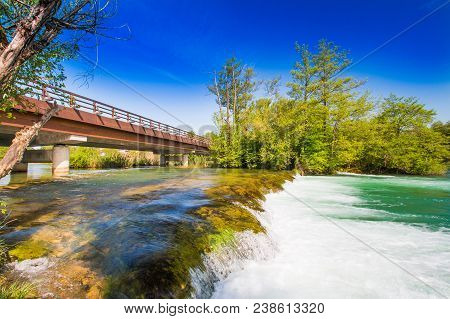 Beautiful Countryside Landscape, Waterfall And Wooden Brigde On Mreznica River In Croatia