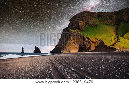 Famous Reynisdrangar Rock Formations At Black Reynisfjara Beach. Coast Of The Atlantic Ocean Near Vi