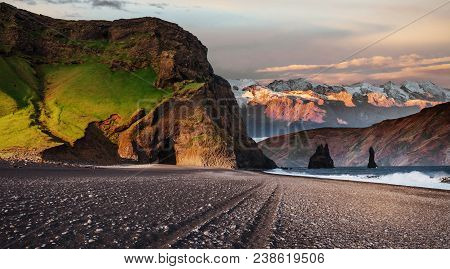 Famous Reynisdrangar Rock Formations At Black Reynisfjara Beach. Coast Of The Atlantic Ocean Near Vi