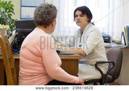 Belarus, Gomel, 24 April 2018. The Gomel Central Hospital.the Doctor Takes The Patient In The Office