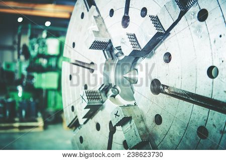 Heavy Duty Lathe Machine Wheel. Modern Metalworking Industry Machinery.
