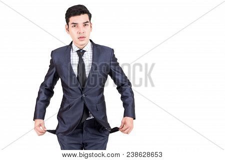 Businessman Showing Empty Pockets Isolated On White Background