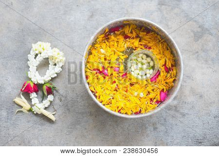Water In Bowl Mixed With Perfume And Flowers Corolla For Songkran Festival In Thailand.
