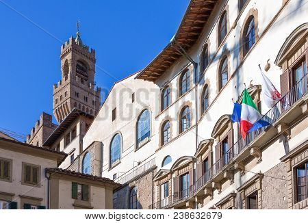 Italy,tuscany,florence, The Houses Of Del Grano Square With The Palazzo Vecchio Bell Tower In The Ba