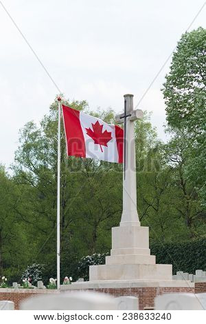 Holten, Netherlands - April 29, 2018: Canadian Flag Next To A Remembrance Cross On The Holten Canadi