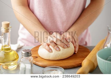 Woman Knead The Dough For Cooking Tortillas On The Wooden Cutting Board. Step By Step Recipe Of Home