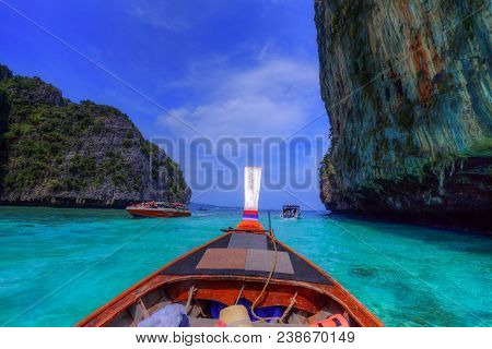 Traditional Passenger Boat On The Sea Of Pileh Region, Phi Phi Lee Bay In Thailand