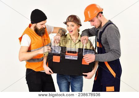 Company Of Cheerful Workers, Builder, Repairer, Plasterer. Strong Woman Concept. Woman Holds Toolbox