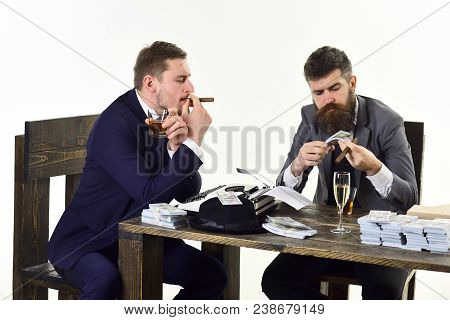 Company Engaged In Illegal Business. Men Sitting At Table With Piles Of Money And Typewriter. Illega
