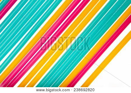 Colorful Of Straw Art Background. Abstract Wallpaper Of Pastel Colored Straws. Rainbow Colored Color