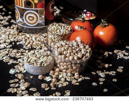 Healthy Diet Raw Cereals On The Black Table Oatmeal