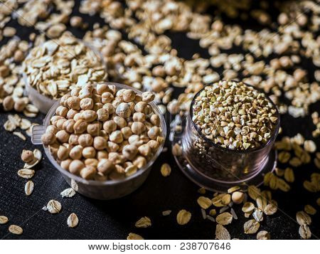 Healthy Diet Raw Cereals On The Black Table Oatmeal