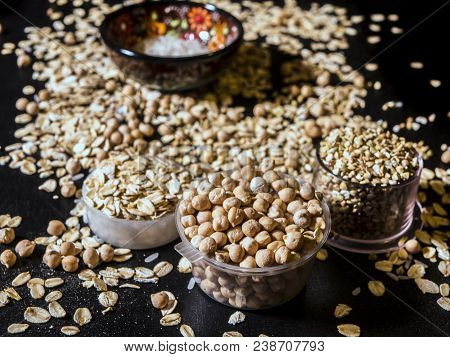 Healthy Diet Raw Cereals On The Black Table Oatmeal