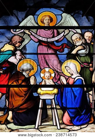 PARIS, FRANCE - JANUARY 04: Nativity Scene, Adoration of the Shepherds, stained glass window in Saint Severin church in Paris, France on January 04, 2018.