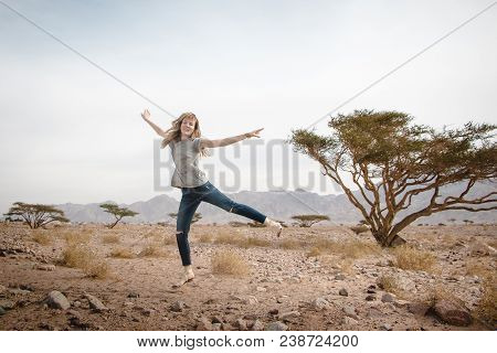 Girl Have Fun In Desert In A Summer Day