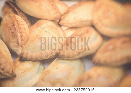 Traditional Empanadas Stuffed With Minced Beef, Pepper And Corn, Served With Aji Picante Sauce