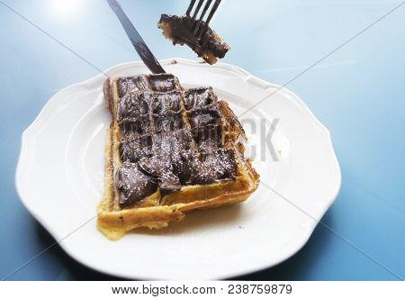 Belgian Waffle Dessert With Chocolate And Hazelnut Cream. Selective Focus.