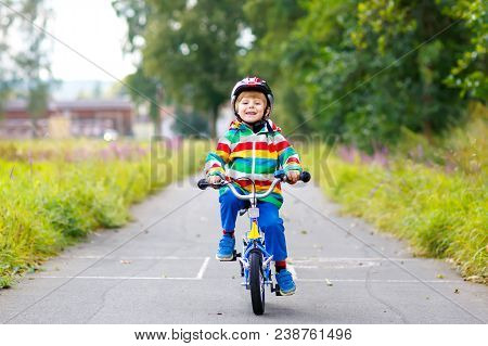 Little Cute Kid Boy On Bicycle On Summer Or Autmn Day. Healthy Happy Child Having Fun With Cycling O