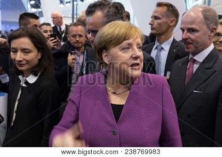 Berlin, Germany - April 25, 2018: Visit Of Chancellor Of Germany Angela Merkel To The Stand Of Liebh