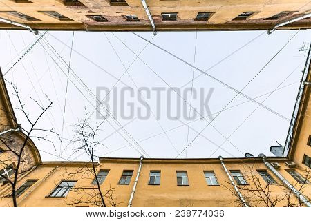 Bottom View Of Many Electrical Wires And Cables Over Urban Yard In Saint Petersburg City In Saint Pe