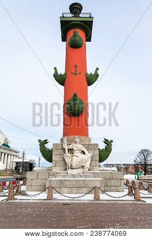 View Of Rostral Column On Spit Of Vasilyevsky Island In Saint Petersburg City In March