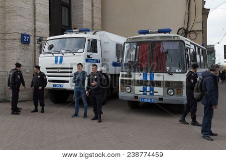 Moscow, Russia - April 30, 2018: The Police Cars And Rosgvardia Are Cordoned Off After A Rally On Sa
