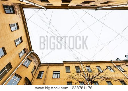 Bottom View Of Many Electrical Wires And Cables Over Urban Courtyard In Saint Petersburg City In Sai