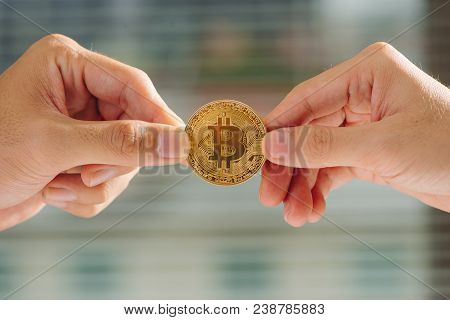 Uncertainty With Bitcoin In Hand,war Of Bitcoin,pull Bitcoin With Hand To Hand, Many Bitcoins Up,on 